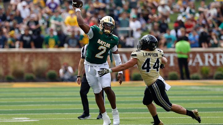 Sep 26, 2026; Waco, Texas, USA; Baylor Bears quarterback DJ Lagway (2) throws a pass as Colorado Buffaloes linebacker Gideon ESPN Lampron (44) defends during the first half at McLane Stadium. Mandatory Credit: Chris Jones-Imagn Images Sep 26, 2026; Waco, Texas, USA; Baylor Bears quarterback DJ Lagway (2) throws a pass as Colorado Buffaloes linebacker Gideon ESPN Lampron (44) defends during the first half at McLane Stadium. Mandatory Credit: Chris Jones-Imagn Images