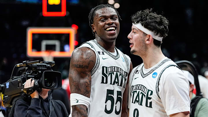 Michigan State forward Coen Carr (55) and forward Frankie Fidler (8) celebrate 71-63 win over New Mexico at the Second Round of NCAA tournament at Rocket Arena in Cleveland, Ohio on Sunday, March 23, 2025.