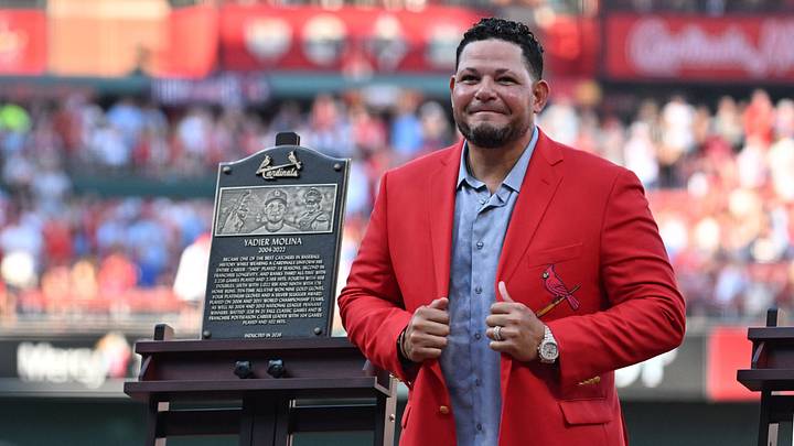 Sep 12, 2026; St. Louis, Missouri, USA;  Yadier Molina stands next to his St. Louis Cardinals Hall of Fame plaque during a ceremony before a game between the St. Louis Cardinals and the Chicago White Sox at Busch Stadium.  Mandatory Credit: Jeff Le-Imagn Images
