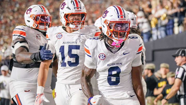 Auburn wide receiver Cam Coleman (8) celebrates this two point conversion against Vanderbilt during the fourth quarter at FirstBank Stadium in Nashville, Tennessee.