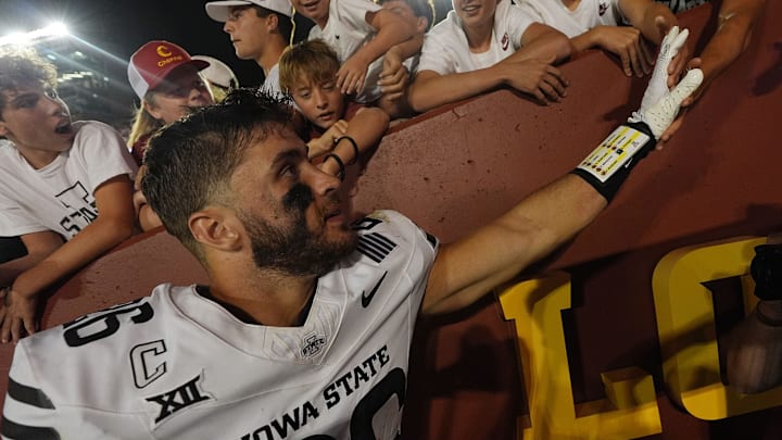 Iowa State Cyclones' running back Carson Hansen (26) celebrates with fans after winning over Arizona in the Big-12 conference showdown on Sept. 27, 2025, at Jack Trice Stadium in Ames, Iowa.