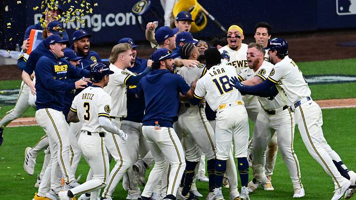 Oct 4, 2026; Milwaukee, Wisconsin, USA;  Milwaukee Brewers celebrate the win against the San Diego Padres in game two of the NLDS for the 2026 MLB Playoffs at American Family Field.  Mandatory Credit: Benny Sieu-Imagn Images