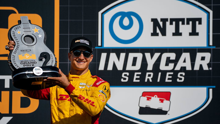 NTT IndyCar Series driver Alex Palou holds his second place trophy after the Music City Grand Prix at the Nashville Superspeedway in Lebanon, Tenn., Sunday, Aug. 31, 2025. NTT IndyCar Series driver Alex Palou holds his second place trophy after the Music City Grand Prix at the Nashville Superspeedway in Lebanon, Tenn., Sunday, Aug. 31, 2025.