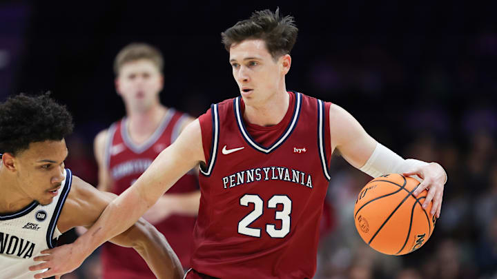 Penn Quakers forward Ethan Roberts (23) dribbles against the Villanova Wildcats at Xfinity Mobile Arena. 