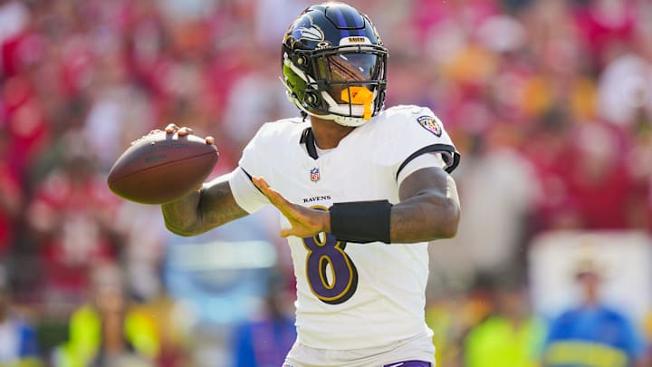 Sep 28, 2025; Kansas City, Missouri, USA; Baltimore Ravens quarterback Lamar Jackson (8) throws a pass during the first half against the Kansas City Chiefs at GEHA Field at Arrowhead Stadium. Mandatory Credit: Jay Biggerstaff-Imagn Images