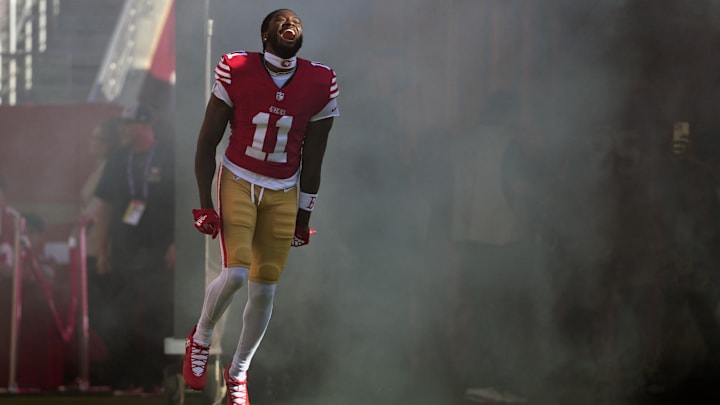 Sep 9, 2024; Santa Clara, California, USA; San Francisco 49ers wide receiver Brandon Aiyuk (11) is introduced to the crowd before the game against the New York Jets at Levi's Stadium. Mandatory Credit: Darren Yamashita-Imagn Images