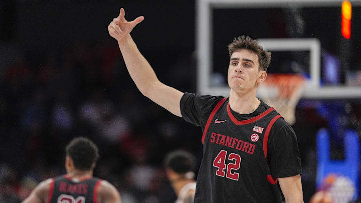 Mar 13, 2025; Charlotte, NC, USA; Stanford Cardinal forward Maxime Raynaud (42) after a dunk against the Louisville Cardinals during the second half at Spectrum Center. Mandatory Credit: Jim Dedmon-Imagn Images