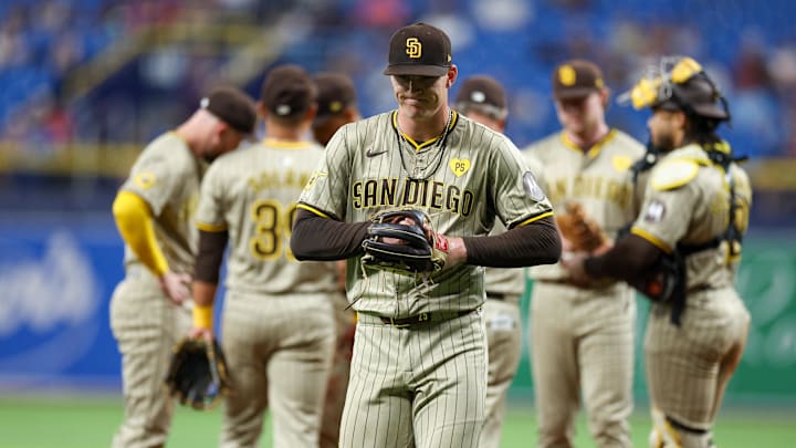 Aug 30, 2024; St. Petersburg, Florida, USA; San Diego Padres pitcher Sean Reynolds (25) leaves the game against the Tampa Bay Rays in the seventh inning at Tropicana Field. Mandatory Credit: Nathan Ray Seebeck-Imagn Images