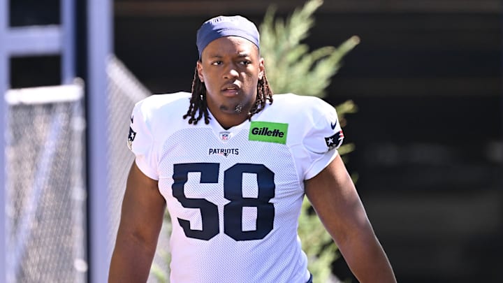Jul 28, 2025; Foxborough, MA, USA; New England Patriots center Jared Wilson (58) heads to the practice fields for training camp at Gillette Stadium. Mandatory Credit: Eric Canha-Imagn Images