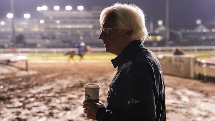 After three years of being away, Baffert takes in the scene of the track early Friday morning before he works his Kentucky Derby horses. 