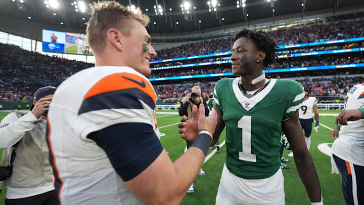 Oct 12, 2025; Tottenham, United Kingdom; Denver Broncos quarterback Bo Nix (10) greets New York Jets cornerback Sauce Gardner (1) after an NFL International Series game at Tottenham Hotspur Stadium. Mandatory Credit: Kirby Lee-Imagn Images