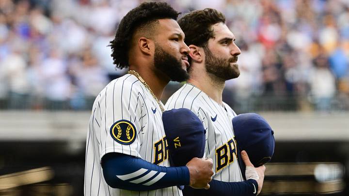 Sep 27, 2026; Milwaukee, Wisconsin, USA; Milwaukee Brewers left fielder Jackson Chourio (11) and center fielder Garrett Mitchell (5) stand at attention during the seventh inning stretch against the St. Louis Cardinals at American Family Field. Mandatory Credit: Benny Sieu-Imagn Images Sep 27, 2026; Milwaukee, Wisconsin, USA; Milwaukee Brewers left fielder Jackson Chourio (11) and center fielder Garrett Mitchell (5) stand at attention during the seventh inning stretch against the St. Louis Cardinals at American Family Field. Mandatory Credit: Benny Sieu-Imagn Images