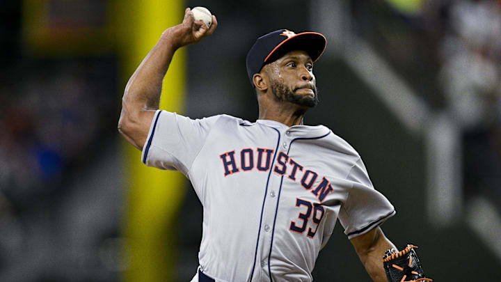 Apr 5, 2024; Arlington, Texas, USA; Houston Astros relief pitcher Miguel Diaz (39) pitches during the game between the Texas Rangers and the Houston Astros at Globe Life Field.