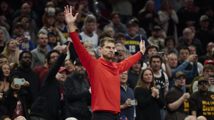 Oct 31, 2025; Portland, Oregon, USA; Portland Trail Blazers assistant coach Tiago Splitter raises reacts in the closing second of a game against the Denver Nuggets at Moda Center. Mandatory Credit: Troy Wayrynen-Imagn Images