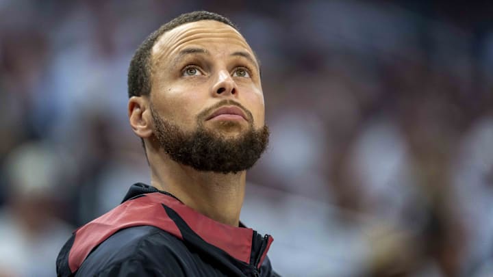 May 8, 2025; Minneapolis, Minnesota, USA; Golden State Warriors guard Stephen Curry (30) looks on from the bench against the Minnesota Timberwolves in the second half during game two of the second round for the 2025 NBA Playoffs at Target Center. Mandatory Credit: Jesse Johnson-Imagn Images May 8, 2025; Minneapolis, Minnesota, USA; Golden State Warriors guard Stephen Curry (30) looks on from the bench against the Minnesota Timberwolves in the second half during game two of the second round for the 2025 NBA Playoffs at Target Center. Mandatory Credit: Jesse Johnson-Imagn Images