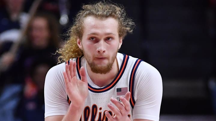 Jan 8, 2026; Champaign, Illinois, USA;  Illinois Fighting Illini forward Jake Davis (15) applauds his team’s performance during the first half against the Rutgers Scarlet Knights at State Farm Center. Mandatory Credit: Ron Johnson-Imagn Images