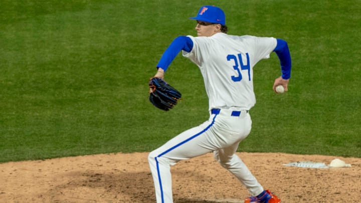 Florida  s Alex Philpott (34) pitches