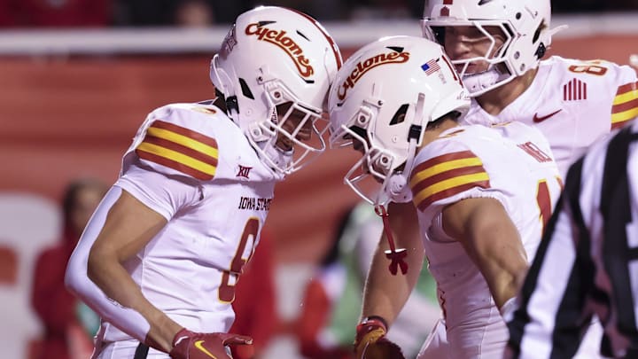 Nov 23, 2024; Salt Lake City, Utah, USA; Iowa State Cyclones wide receiver Jayden Higgins (9) scores a touchdown against the Utah Utes during the first quarter at Rice-Eccles Stadium. Mandatory Credit: Rob Gray-Imagn Images
