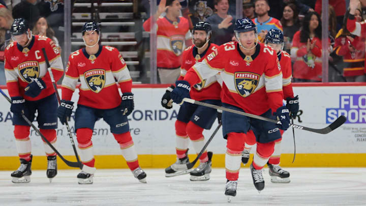 Feb 2, 2025; Sunrise, Florida, USA; Florida Panthers center Carter Verhaeghe (23) looks on after scoring against the New York Islanders during the first period at Amerant Bank Arena. Mandatory Credit: Sam Navarro-Imagn Images