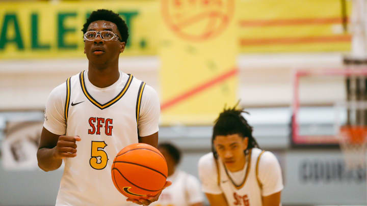 Team SFG’s Bryce James (5) prepares to shoot a free throw against Team Boo Williams during the Nike Elite Youth Basketball League session one on Friday, April 26, 2024 at the Memphis Sports & Event Center in Memphis, Tenn.