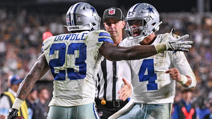 Dallas Cowboys running back Rico Dowdle celebrates a touchdown with quarterback Dak Prescott against the Pittsburgh Steelers during the fourth quarter at Acrisure Stadium. Mandatory Credit: Barry Reeger-Imagn Images Dallas Cowboys running back Rico Dowdle celebrates a touchdown with quarterback Dak Prescott against the Pittsburgh Steelers during the fourth quarter at Acrisure Stadium. Mandatory Credit: Barry Reeger-Imagn Images