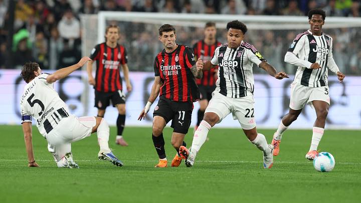 Christian Pulisic and Weston McKenzie play on opposite sides during an AC Milan vs Juventus match.