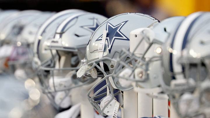 A view of Dallas Cowboys players' helmets on the bench against the Washington Commanders at FedExField. 