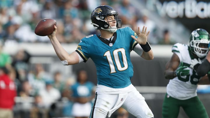 Dec 15, 2024; Jacksonville, Florida, USA; Jacksonville Jaguars quarterback Mac Jones (10) throws a pass against the New York Jets during the third quarter at EverBank Stadium. Mandatory Credit: Morgan Tencza-Imagn Images
