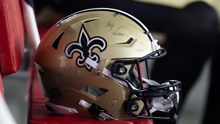 Aug 10, 2024; Glendale, Arizona, USA; Detailed view of a New Orleans Saints helmet during a preseason NFL game at State Farm Stadium. Mandatory Credit: Mark J. Rebilas-Imagn Images