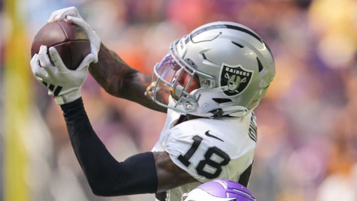 Aug 10, 2024; Minneapolis, Minnesota, USA; Las Vegas Raiders cornerback Jack Jones (18) interecpts a pass from Minnesota Vikings quarterback J.J. McCarthy (9) in the second quarter at U.S. Bank Stadium. Mandatory Credit: Brad Rempel-USA TODAY Sports
