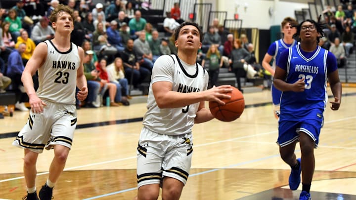 Corning's Kyler Stevenson (5) goes up for a layup during a 92-53 win over Horseheads in a STAC West boys basketball game on Jan. 9.