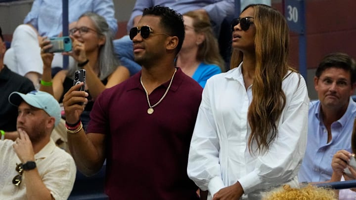 Russell Wilson and Ciara attending a US Open tennis match.