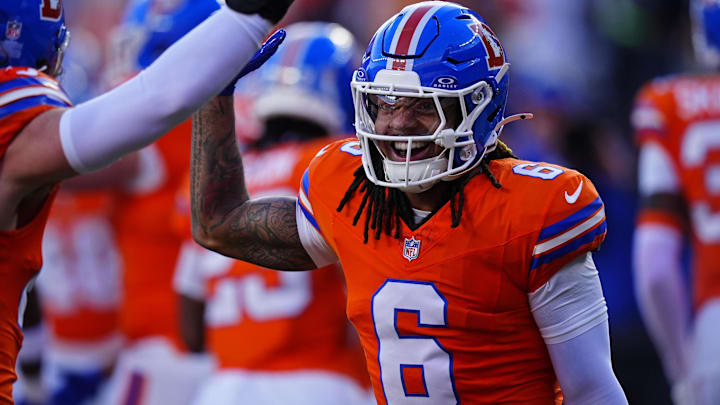Jan 4, 2026; Denver, Colorado, USA; Denver Broncos safety P.J. Locke (6) smiles during the first half against the Los Angeles Chargers at Empower Field at Mile High. Mandatory Credit: Ron Chenoy-Imagn Images