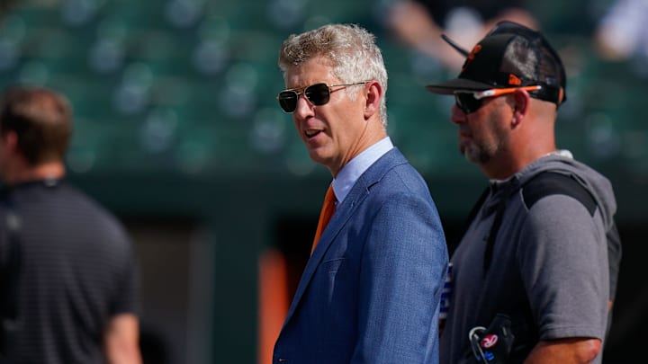 Jul 27, 2022; Baltimore, Maryland, USA; Baltimore Orioles general manager Mike Elias reacts on the field before the game between the Baltimore Orioles and the Tampa Bay Rays at Oriole Park at Camden Yards.