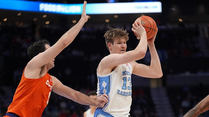 Mar 12, 2026; Charlotte, NC, USA; North Carolina Tar Heels center Henri Veesaar (13) handles the ball during the first half against the Clemson Tigers at Spectrum Center. Mandatory Credit: Jim Dedmon-Imagn Images