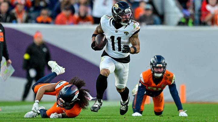 DENVER, CO - DECEMBER 21: Jacksonville Jaguars wide receiver Parker Washington (11) runs after a catch in the second half during a game between the Jacksonville Jaguars and the Denver Broncos at Empower Field at Mile High on December 21, 2025 in Denver, Colorado. DENVER, CO - DECEMBER 21: Jacksonville Jaguars wide receiver Parker Washington (11) runs after a catch in the second half during a game between the Jacksonville Jaguars and the Denver Broncos at Empower Field at Mile High on December 21, 2025 in Denver, Colorado.