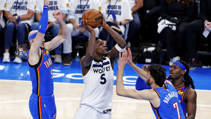 May 28, 2025; Oklahoma City, Oklahoma, USA; Minnesota Timberwolves guard Anthony Edwards (5) drives to the basket against Oklahoma City Thunder guard Alex Caruso (9) during the third quarter in game five of the western conference finals for the 2025 NBA Playoffs at Paycom Center. Mandatory Credit: Alonzo Adams-Imagn Images May 28, 2025; Oklahoma City, Oklahoma, USA; Minnesota Timberwolves guard Anthony Edwards (5) drives to the basket against Oklahoma City Thunder guard Alex Caruso (9) during the third quarter in game five of the western conference finals for the 2025 NBA Playoffs at Paycom Center. Mandatory Credit: Alonzo Adams-Imagn Images