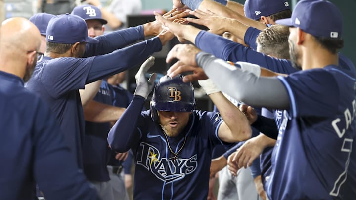 Apr 5, 2025; Arlington, Texas, USA; Tampa Bay Rays second baseman Brandon Lowe (8) celebrates with teammates after hitting a home run during the third inning against the Texas Rangers at Globe Life Field. Apr 5, 2025; Arlington, Texas, USA; Tampa Bay Rays second baseman Brandon Lowe (8) celebrates with teammates after hitting a home run during the third inning against the Texas Rangers at Globe Life Field.