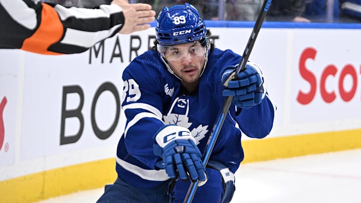 Apr 1, 2024; Toronto, Ontario, CAN; Toronto Maple Leafs forward Nick Robertson (89) celebrates after scoring a goal against the Florida Panthers in the first period at Scotiabank Arena. Mandatory Credit: Dan Hamilton-Imagn Images