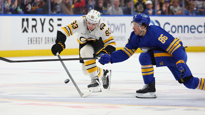 Boston Bruins forward Fraser Minten and Buffalo Sabres forward Noah Ostlund