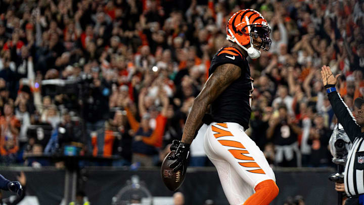 Cincinnati Bengals wide receiver Tee Higgins (5) reacts to scoring a touchdown in the second quarter of the NFL game against the Denver Broncos at Paycor Stadium in Cincinnati on Saturday, Dec. 28, 2024.