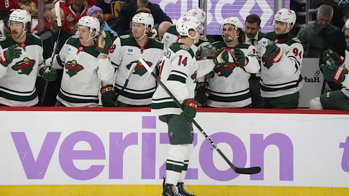 Jan 26, 2025; Chicago, Illinois, USA; Minnesota Wild center Joel Eriksson Ek (14) celebrates his goal against the Chicago Blackhawks during the second period at United Center. Mandatory Credit: David Banks-Imagn Images