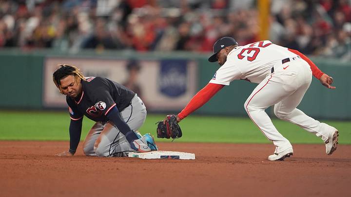 Sep 23, 2026: Cleveland Guardians third baseman Jose Ramirez (11) steals second base ahead of the tag by Boston Red Sox second baseman Andruw Monasterio (32) during the fourth inning at Fenway Park. Credit: Gregory Fisher-Imagn Images