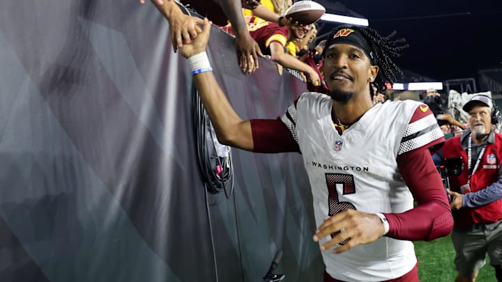 Washington Commanders quarterback Jayden Daniels celebrates with fans following the win against the Cincinnati Bengals. Washington Commanders quarterback Jayden Daniels celebrates with fans following the win against the Cincinnati Bengals.