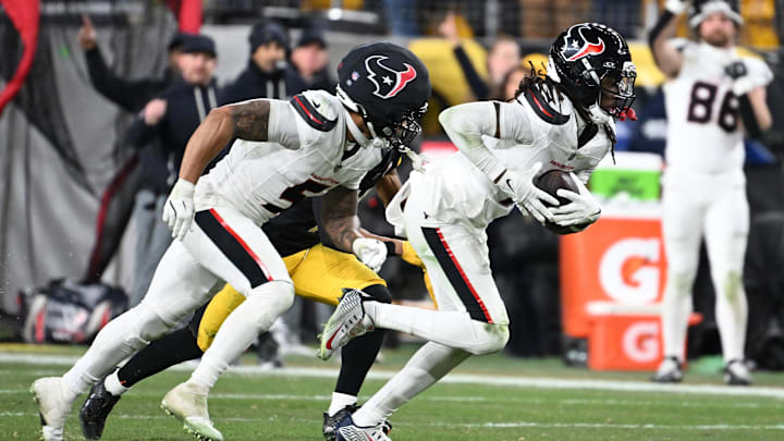 Houston Texans safety Calen Bullock returns an interception for a touchdown during the fourth quarter against the Pittsburgh Steelers.