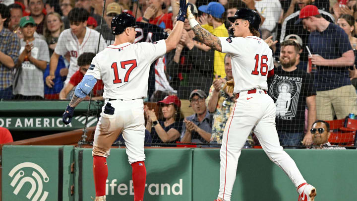 Jun 12, 2024; Boston, Massachusetts, USA; Boston Red Sox outfielder Jarren Duran (16) high-fives outfielder Tyler O'Neill (17) during the fifth inning at Fenway Park. Duran scored on a RBI hit by O'Neill. Mandatory Credit: Brian Fluharty-USA TODAY Sports Jun 12, 2024; Boston, Massachusetts, USA; Boston Red Sox outfielder Jarren Duran (16) high-fives outfielder Tyler O'Neill (17) during the fifth inning at Fenway Park. Duran scored on a RBI hit by O'Neill. Mandatory Credit: Brian Fluharty-USA TODAY Sports