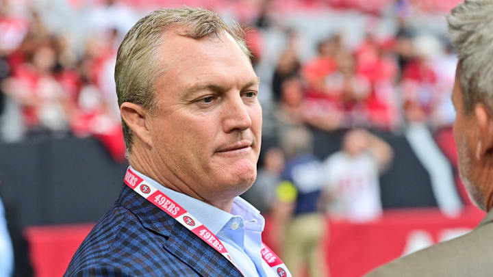 Nov 16, 2025; Glendale, Arizona, USA; San Francisco 49ers general manager John Lynch speaks on the sidelines before the game against the Arizona Cardinals at State Farm Stadium. Mandatory Credit: Matt Kartozian-Imagn Images