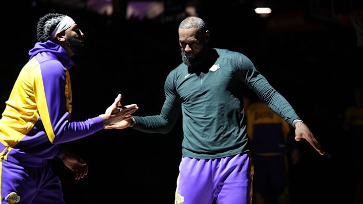 Dec 19, 2024; Sacramento, California, USA; Los Angeles Lakers forward LeBron James (23) meets with forward Anthony Davis (3) before the start of the game against the Sacramento Kings at the Golden 1 Center. Mandatory Credit: Cary Edmondson-Imagn Images
