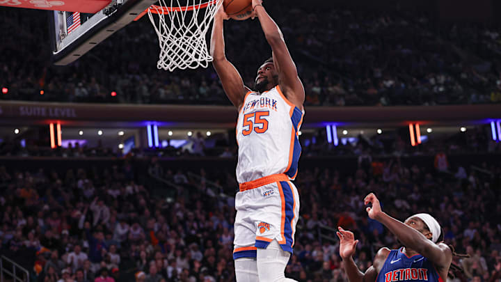 Dec 7, 2024; New York, New York, USA; New York Knicks center Ariel Hukporti (55) dunks during the second half against the Detroit Pistons at Madison Square Garden. Mandatory Credit: Vincent Carchietta-Imagn Images