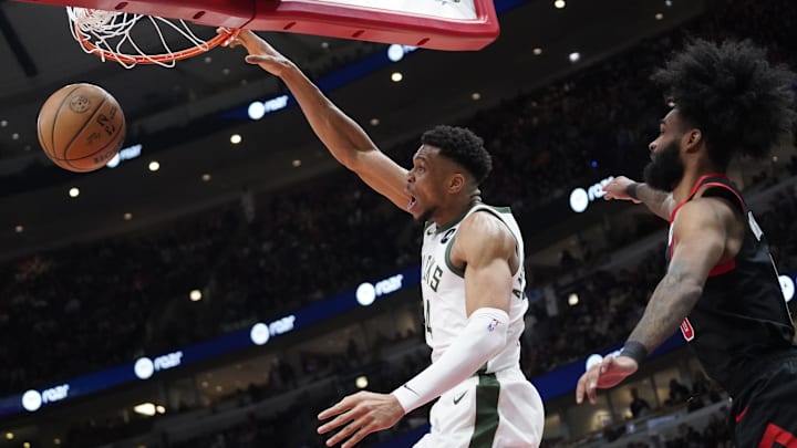 Mar 1, 2024; Chicago, Illinois, USA; Milwaukee Bucks forward Giannis Antetokounmpo (34) dunks the ball on Chicago Bulls guard Coby White (0) during the second half at United Center. Mandatory Credit: David Banks-Imagn Images